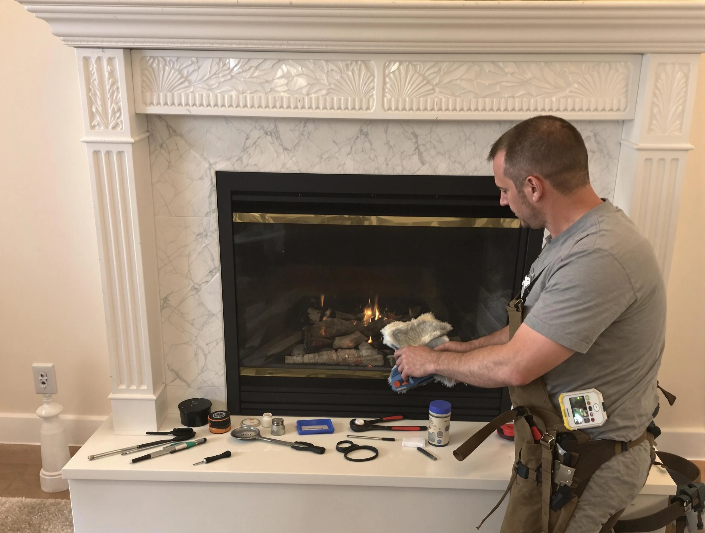 Chelmsford Chimney Sweep performing fireplace maintenance in Chelmsford, MA